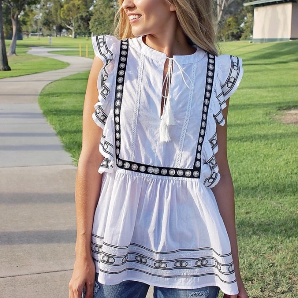 Elle embroidered top.